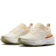 Zoomx Invincible Run 3 Light Cream Topaz Gold Sea Coral Women